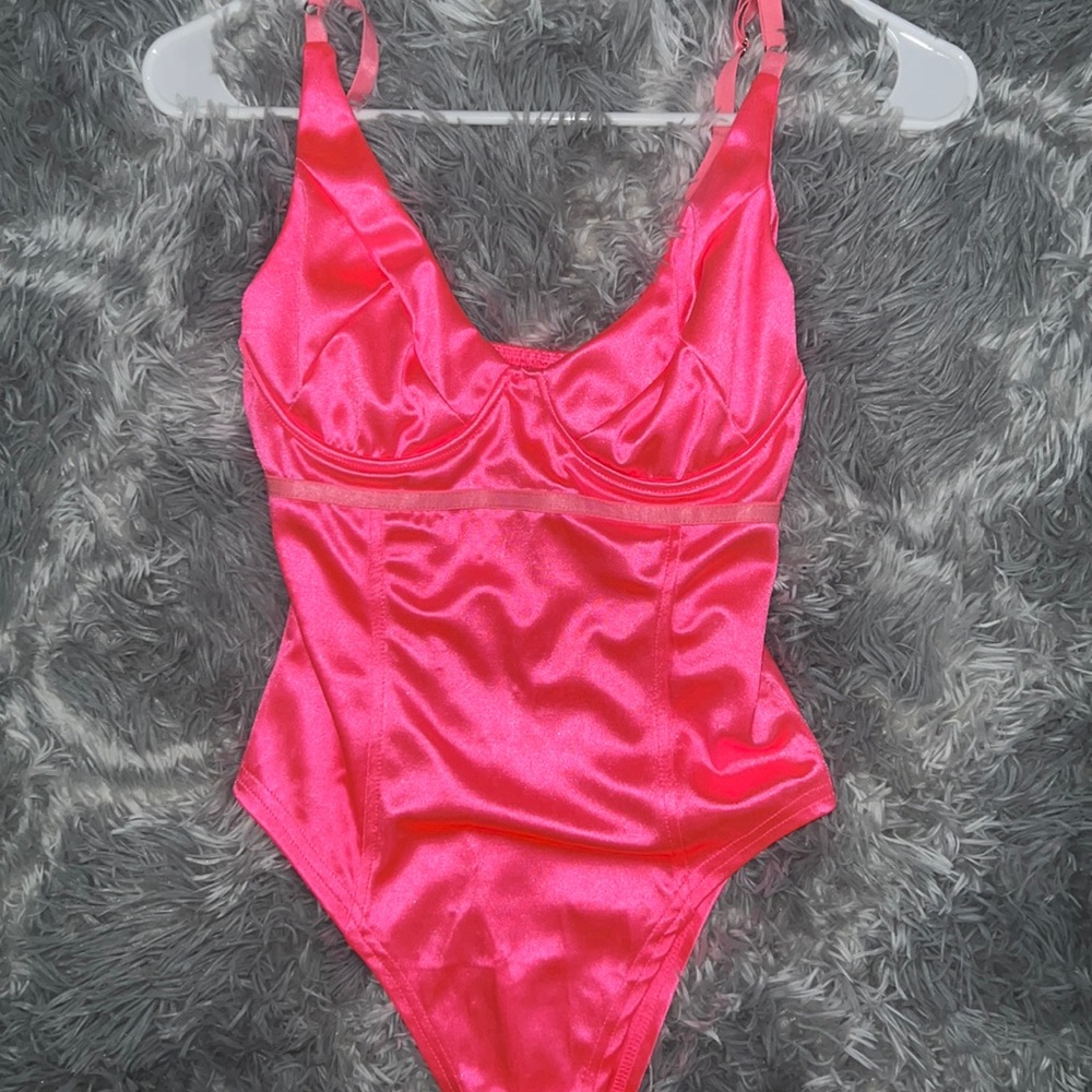 Hot pink body suit